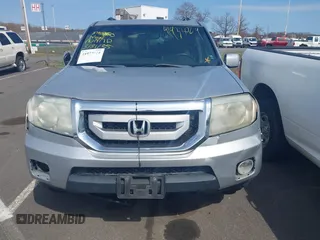 2011 Honda Pilot EX-L with VIN 5FNYF4H68BB017361, listed as a IAAI auction lot 41933024 with 338,819 mi miles and . Bid and sale history available at carsss.com. Image 10.