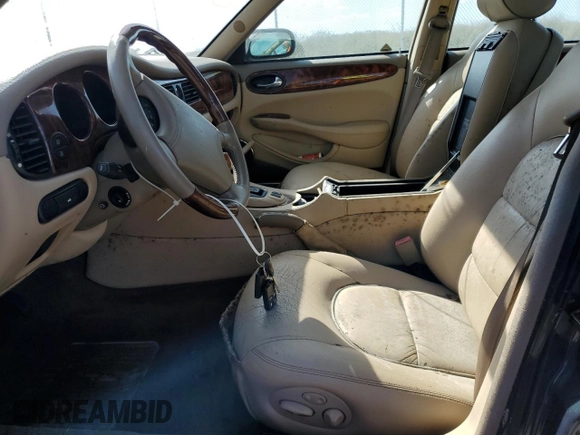 1999 Jaguar XJ with VIN SAJKX6047XC861227, listed as a Copart auction lot 75007414 with Not provided miles and Salvage title. Bid and sale history available at DreamBid. Image 7.