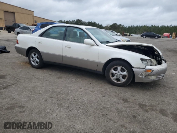 1998 Lexus ES 300 с VIN JT8BF28G9W0141533, выставлен на аукционе Copart как лот 51620225 с пробегом 141 068 миль миль и Списание • Salvage title. История ставок и продаж доступна на DreamBid. Изображение 4.