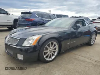 2006 Cadillac XLR z VIN 1G6YX36D465603297, wystawiony jako Copart lot #74231644 z przebiegiem Nie podano mil oraz Szkody całkowita. Historia ofert i sprzedaży dostępna na DreamBid. Obrazek 1.