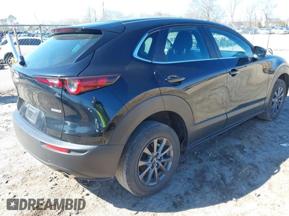 2021 Mazda CX-30 S with VIN 3MVDMAALXMM269676, listed as a IAAI auction lot 41581451 with 33,449 mi miles and . Bid and sale history available at DreamBid. Image 4.