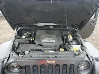 2014 Jeep Wrangler Unlimited Sahara with VIN 1C4HJWEG7EL299548, listed as a Copart auction lot 58522355 with 76,057 mi miles and Clean title. Bid and sale history available at DreamBid. Image 12.