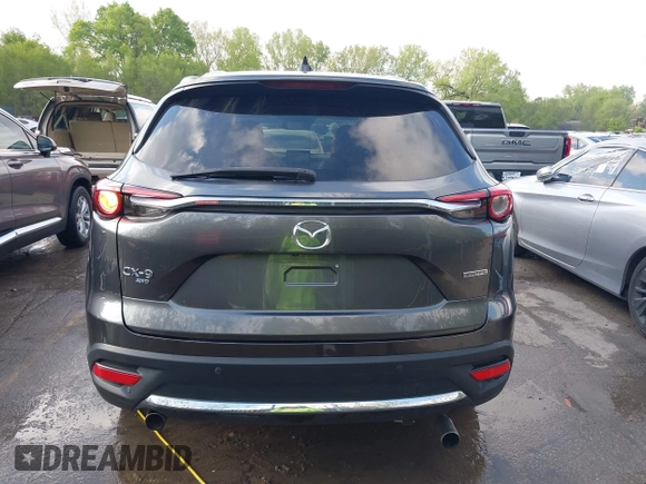 2020 Mazda CX-9 Signature with VIN JM3TCBEYXL0402053, listed as a IAAI auction lot 42070846 with 47,695 mi miles and . Bid and sale history available at DreamBid. Image 17.