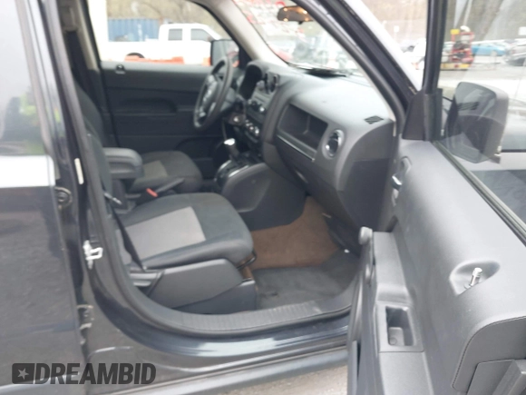 2014 Jeep Patriot Sport with VIN 1C4NJPBB7ED822885, listed as a IAAI auction lot 41947079 with 76,740 mi miles. Bid and sale history available at carsss.com. Image 5.