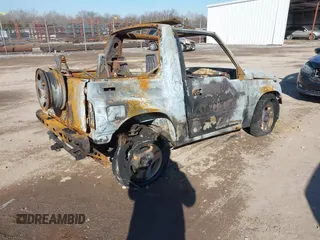 1996 Chevrolet Tracker z VIN 2CNBJ1869T6914128, wystawiony jako IAAI lot #41399004 z przebiegiem Nie podano mil oraz . Historia ofert i sprzedaży dostępna na DreamBid. Obrazek 4.