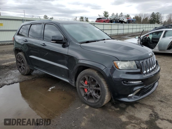 2012 Jeep Grand Cherokee SRT8 with VIN 1C4RJFDJ4CC350907, listed as a Copart auction lot 49409205 with 171,352 mi miles and Clean Title. Bid and sale history available at carsss.com. Image 4.