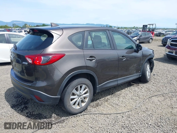 2016 Mazda CX-5 Sport with VIN JM3KE4BY8G0785812, listed as a IAAI auction lot 42324083 with 57,405 mi miles and . Bid and sale history available at DreamBid. Image 4.