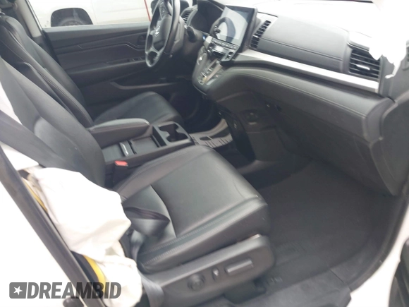 2022 Honda Odyssey EX-L with VIN 5FNRL6H76NB002248, listed as a IAAI auction lot 41818243 with 32,952 mi miles and . Bid and sale history available at DreamBid. Image 5.