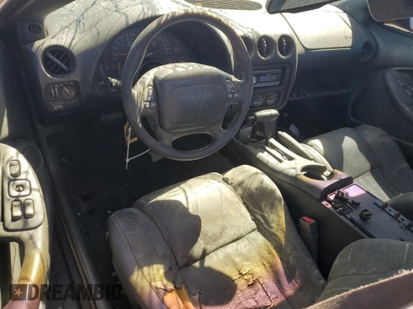 1998 Pontiac Firebird Formula z VIN 2G2FV22G4W2206032, wystawiony jako Copart lot #74949124 z przebiegiem 230 520 mil mil oraz Szkoda całkowita • Salvage title. Historia ofert i sprzedaży dostępna na DreamBid. Obrazek 8.