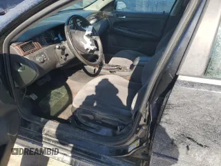 2014 Chevrolet Impala LT with VIN 2G1WB5E36E1190332, listed as a Copart auction lot 46111685 with 152,931 mi miles and Salvage title. Bid and sale history available at DreamBid. Image 7.