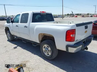2014 Chevrolet Silverado 2500HD LT with VIN 1GC1CXCG5EF186765, listed as a IAAI auction lot 41906447 with 223,521 mi miles. Bid and sale history available at carsss.com. Image 3.