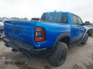 2021 Ram 1500 TRX with VIN 1C6SRFU91MN790158, listed as a IAAI auction lot 42115253 with 30,969 mi miles and . Bid and sale history available at DreamBid. Image 4.