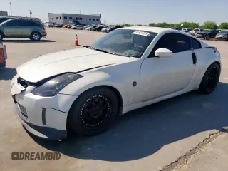 2003 Nissan 350Z Touring z VIN JN1AZ34E23T003151, wystawiony jako Copart lot #51874725 z przebiegiem 197 576 mil mil oraz Szkoda całkowita • Salvage title. Historia ofert i sprzedaży dostępna na DreamBid. Obrazek 1.