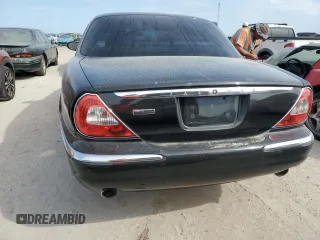 2006 Jaguar XJ with VIN SAJWA71BX6SH01193, listed as a Copart auction lot 76382034 with 0 mi miles and Salvage Title. Bid and sale history available at carsss.com. Image 6.