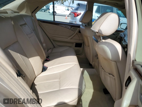 2001 Mercedes-Benz E-Class with VIN WDBJF65J11B357893, listed as a Copart auction lot 48573305 with 141,044 mi miles and Salvage Title. Bid and sale history available at carsss.com. Image 10.