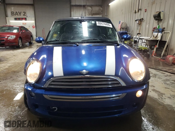 2007 MINI Convertible with VIN WMWRF33507TG16448, listed as a Copart auction lot 88474495 with 148,147 mi miles and Salvage Title. Bid and sale history available at DreamBid. Image 5.