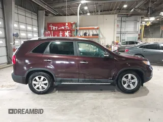 2012 Kia Sorento LX with VIN 5XYKTCA66CG264679, listed as a IAAI auction lot 41742682 with 161,781 mi miles. Bid and sale history available at carsss.com. Image 13.