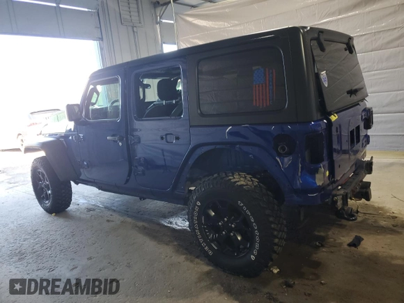2020 Jeep Wrangler Unlimited Black and Tan with VIN 1C4HJXDG1LW267312, listed as a Copart auction lot 49658135 with 66,624 mi miles and Salvage title. Bid and sale history available at DreamBid. Image 2.