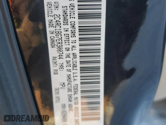 2014 Chrysler Town & Country Touring with VIN 2C4RC1BG7ER300744, listed as a Copart auction lot 37990234 with 111,952 mi miles and Salvage Title. Bid and sale history available at carsss.com. Image 15.