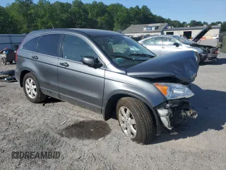 2011 Honda CR-V SE z VIN JHLRE4H49BC010974, wystawiony jako Copart lot #57595415 z przebiegiem Nie podano mil oraz Szkoda całkowita • Salvage title. Historia ofert i sprzedaży dostępna na DreamBid. Obrazek 4.