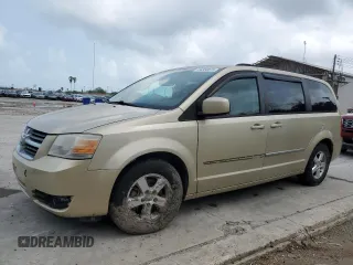 2010 Dodge Grand Caravan with VIN 2D4RN5D12AR197403, listed as a Copart auction lot 54356515 with 105,318 mi miles and Salvage Title. Bid and sale history available at DreamBid. Image 1.