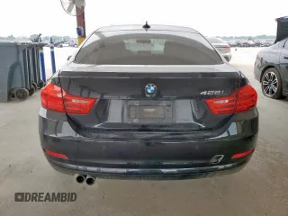 2015 BMW 4 Series 428i z VIN WBA4A5C54FD410835, wystawiony jako Copart lot #57034575 z przebiegiem 135 644 mil mil oraz Czysty tytuł • Clean title. Historia ofert i sprzedaży dostępna na DreamBid. Obrazek 6.