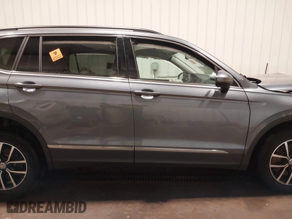2021 Volkswagen Tiguan SE with VIN 3VV3B7AX3MM118463, listed as a IAAI auction lot 42138702 with 48,058 mi miles and . Bid and sale history available at DreamBid. Image 14.