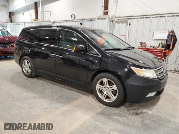 2011 Honda Odyssey Touring with VIN 5FNRL5H98BB027997, listed as a Copart auction lot 63239175 with 282,123 mi miles and Clean title. Bid and sale history available at DreamBid. Image 4.