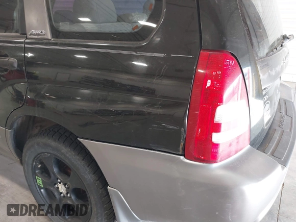 2003 Subaru Forester XS with VIN JF1SG65643H755247, listed as a IAAI auction lot 41836577 with 184,677 mi miles. Bid and sale history available at carsss.com. Image 14.