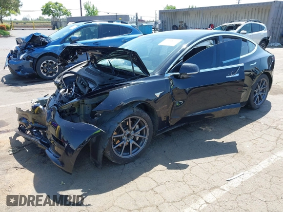 2018 Tesla Model 3 Long Range Battery z VIN 5YJ3E1EA2JF095525, wystawiony jako IAAI lot #42148713 z przebiegiem Nie podano mil oraz . Historia ofert i sprzedaży dostępna na DreamBid. Obrazek 18.