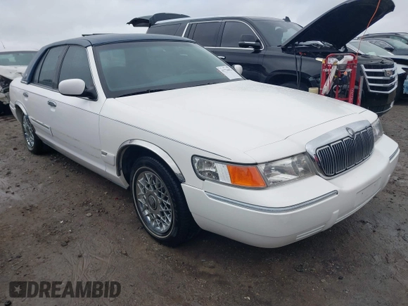 1999 Mercury Grand Marquis GS z VIN 2MEFM74W9XX622371, wystawiony jako IAAI lot #41721054 z przebiegiem 131 724 mil mil oraz . Historia ofert i sprzedaży dostępna na DreamBid. Obrazek 1.