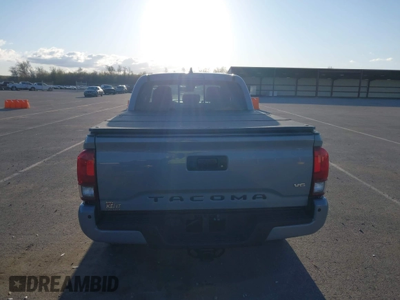 2018 Toyota Tacoma SR5 with VIN 3TMDZ5BN3JM054548, listed as a IAAI auction lot 42038480 with 122,242 mi miles and . Bid and sale history available at DreamBid. Image 16.