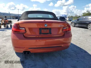 2016 BMW 2 Series 228i with VIN WBA1K9C50GV710942, listed as a Copart auction lot 77700934 with 28,643 mi miles and Salvage Title. Bid and sale history available at carsss.com. Image 6.