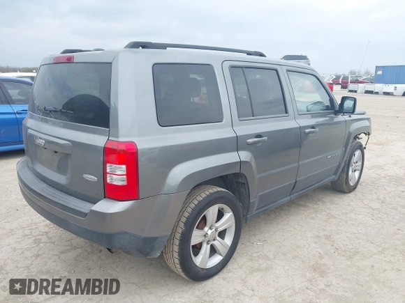 2014 Jeep Patriot Latitude with VIN 1C4NJPFAXED507693, listed as a IAAI auction lot 41701193 with 104,130 mi miles and . Bid and sale history available at DreamBid. Image 4.