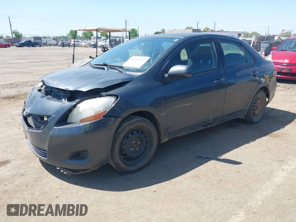 2009 Toyota Yaris with VIN JTDBT903891349784, listed as a IAAI auction lot 42135557 with 244,107 mi miles. Bid and sale history available at carsss.com. Image 2.