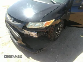 2013 Honda Civic Cpe LX with VIN 2HGFG3B51DH520775, listed as a IAAI auction lot 41853604 with 219,336 mi miles. Bid and sale history available at carsss.com. Image 6.