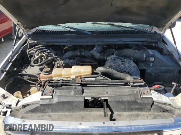 2000 Ford Excursion XLT z VIN 1FMSU41F0YEC90872, wystawiony jako Copart lot #77243644 z przebiegiem 90 302 mil mil oraz Szkoda całkowita • Salvage title. Historia ofert i sprzedaży dostępna na DreamBid. Obrazek 11.