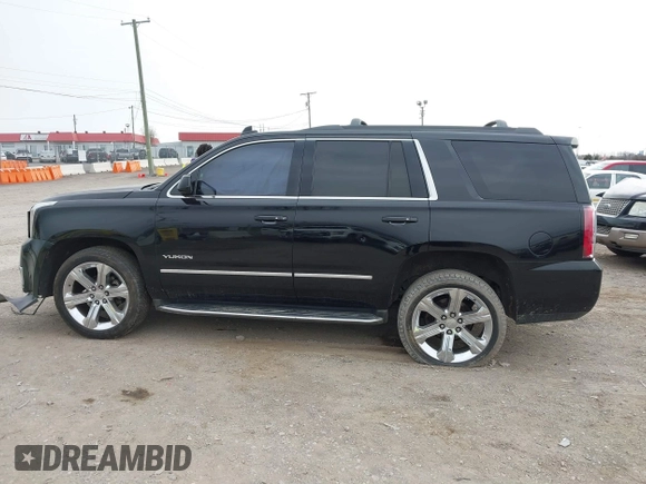 2016 GMC Yukon SLT with VIN 1GKS1BKC3GR272738, listed as a IAAI auction lot 41712439 with 169,726 mi miles. Bid and sale history available at carsss.com. Image 14.