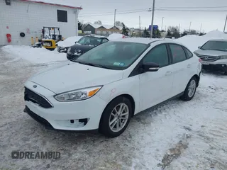 2017 Ford Focus SE with VIN 1FADP3F20HL235067, listed as a IAAI auction lot 41580300 with 79,009 mi miles and . Bid and sale history available at DreamBid. Image 2.