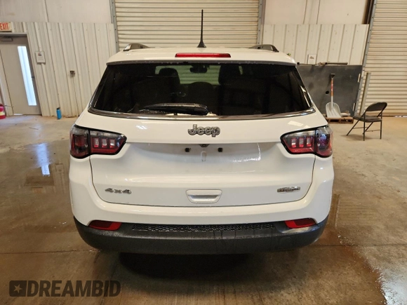 2023 Jeep Compass Latitude with VIN 3C4NJDBNXPT561810, listed as a Copart auction lot 64895215 with 59,166 mi miles and Clean title. Bid and sale history available at DreamBid. Image 6.