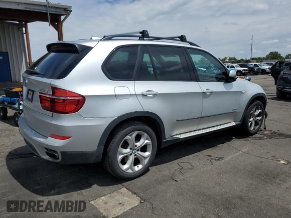 2013 BMW X5 xDrive50i with VIN 5UXZV8C58D0C14983, listed as a Copart auction lot 58820795 with 99,337 mi miles and Salvage title. Bid and sale history available at DreamBid. Image 3.