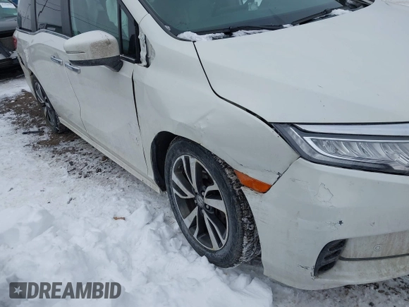 2023 Honda Odyssey Touring with VIN 5FNRL6H84PB048916, listed as a IAAI auction lot 41325052 with 50,290 mi miles and . Bid and sale history available at DreamBid. Image 6.