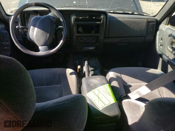 2000 Jeep Cherokee z VIN 1J4FF48S3YL180200, wystawiony jako Copart lot #55994215 z przebiegiem 209 182 mil mil oraz Szkoda całkowita • Salvage title. Historia ofert i sprzedaży dostępna na DreamBid. Obrazek 8.