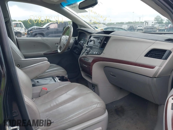 2012 Toyota Sienna XLE AAS with VIN 5TDYK3DC3CS255214, listed as a IAAI auction lot 42390803 with 113,425 mi miles and . Bid and sale history available at DreamBid. Image 5.