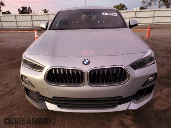 2020 BMW X2 sDrive28i with VIN WBXYH9C09L5P95698, listed as a Copart auction lot 87486094 with 45,319 mi miles and Salvage Title. Bid and sale history available at carsss.com. Image 5.