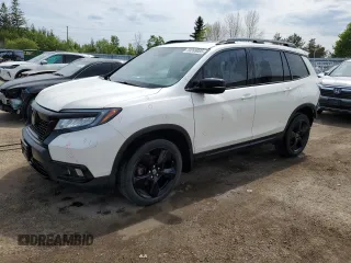 2019 Honda Passport Touring z VIN 5FNYF8H97KB501488, wystawiony jako Copart lot #59269085 z przebiegiem 158 006 mil mil oraz Szkoda całkowita • Salvage title. Historia ofert i sprzedaży dostępna na DreamBid. Obrazek 1.