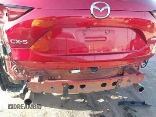 2020 Mazda CX-5 Grand Touring with VIN JM3KFADM7L0729537, listed as a IAAI auction lot 41864569 with 82,998 mi miles. Bid and sale history available at carsss.com. Image 6.