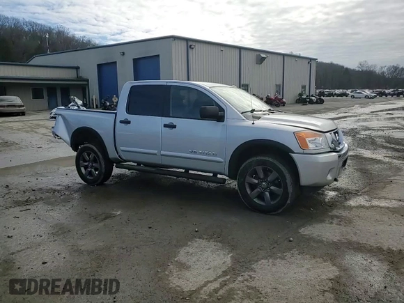 2015 Nissan Titan Pro-4X with VIN 1N6AA0EC1FN512072, listed as a Copart auction lot 85733174 with 92,460 mi miles and Salvage title. Bid and sale history available at DreamBid. Image 14.