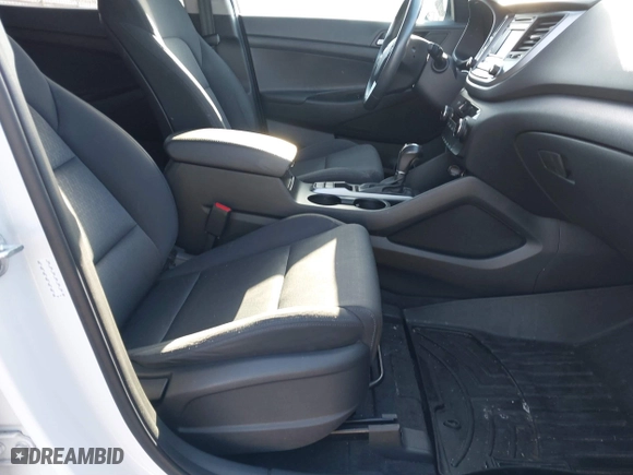 2017 Hyundai Tucson Value with VIN KM8J33A28HU533047, listed as a IAAI auction lot 41853087 with 74,238 mi miles. Bid and sale history available at carsss.com. Image 5.