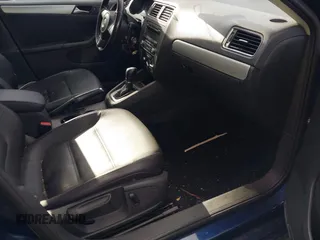 2013 Volkswagen Jetta Sedan SE with VIN 3VWDP7AJ8DM395980, listed as a IAAI auction lot 41013666 with 142,537 mi miles. Bid and sale history available at carsss.com. Image 5.